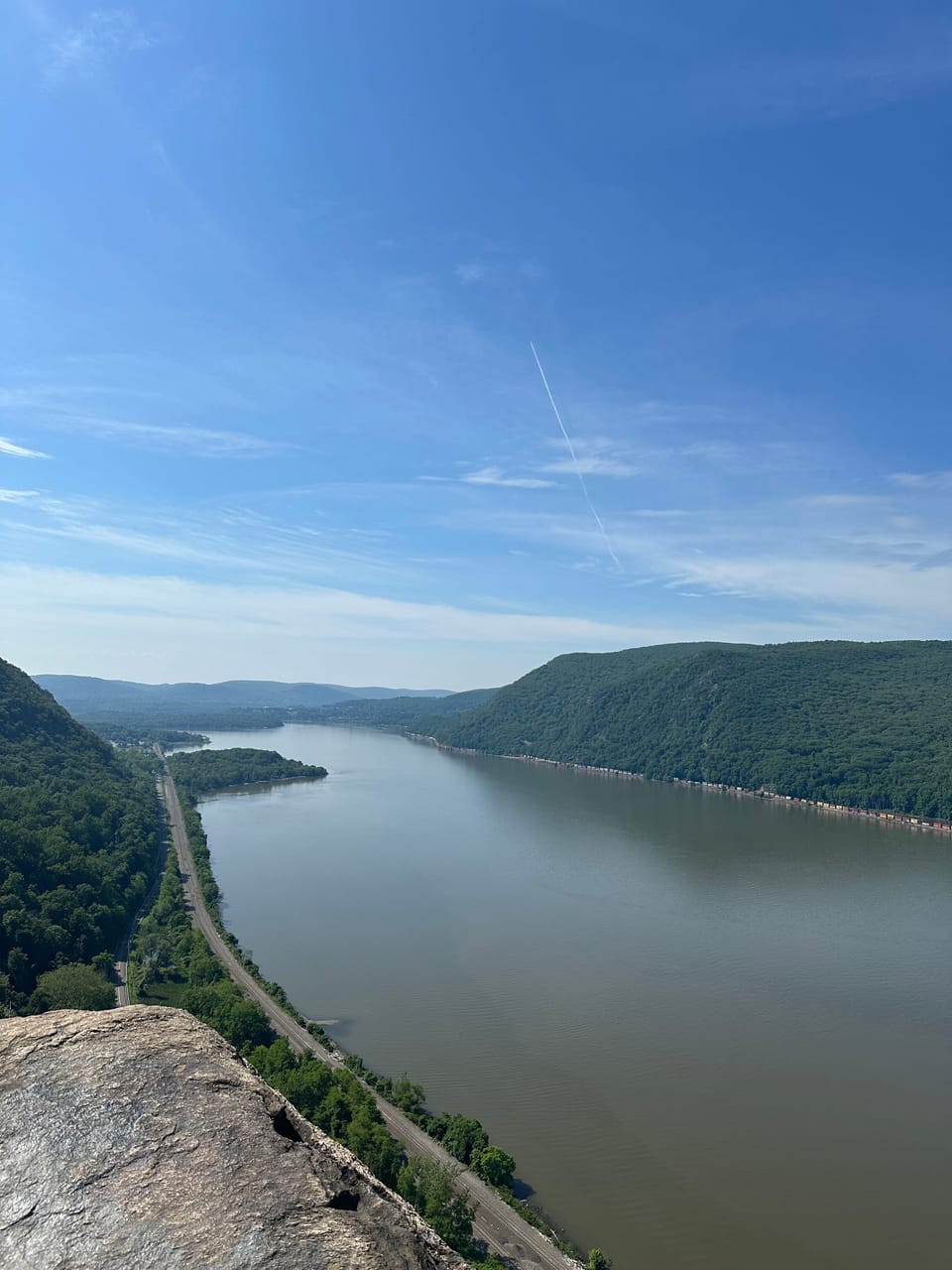 A river and mountains with trees