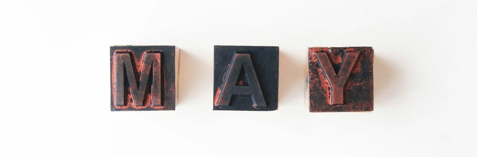 Blocks that spell out "MAY"